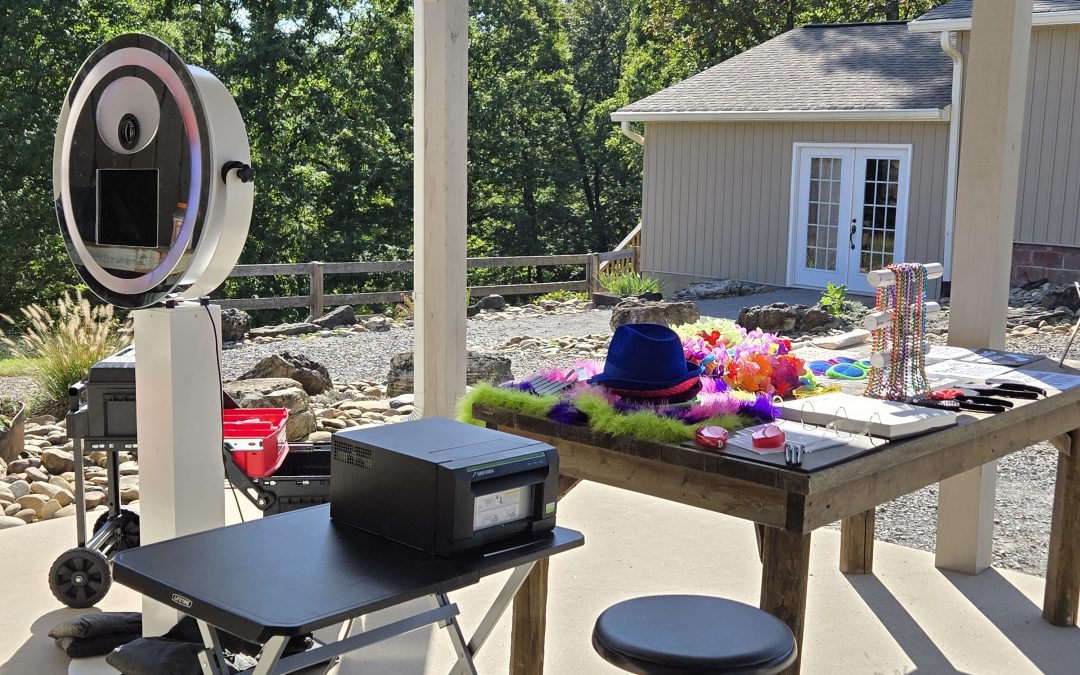 Wooden table displaying various craft supplies and tools in a workspace setting.
