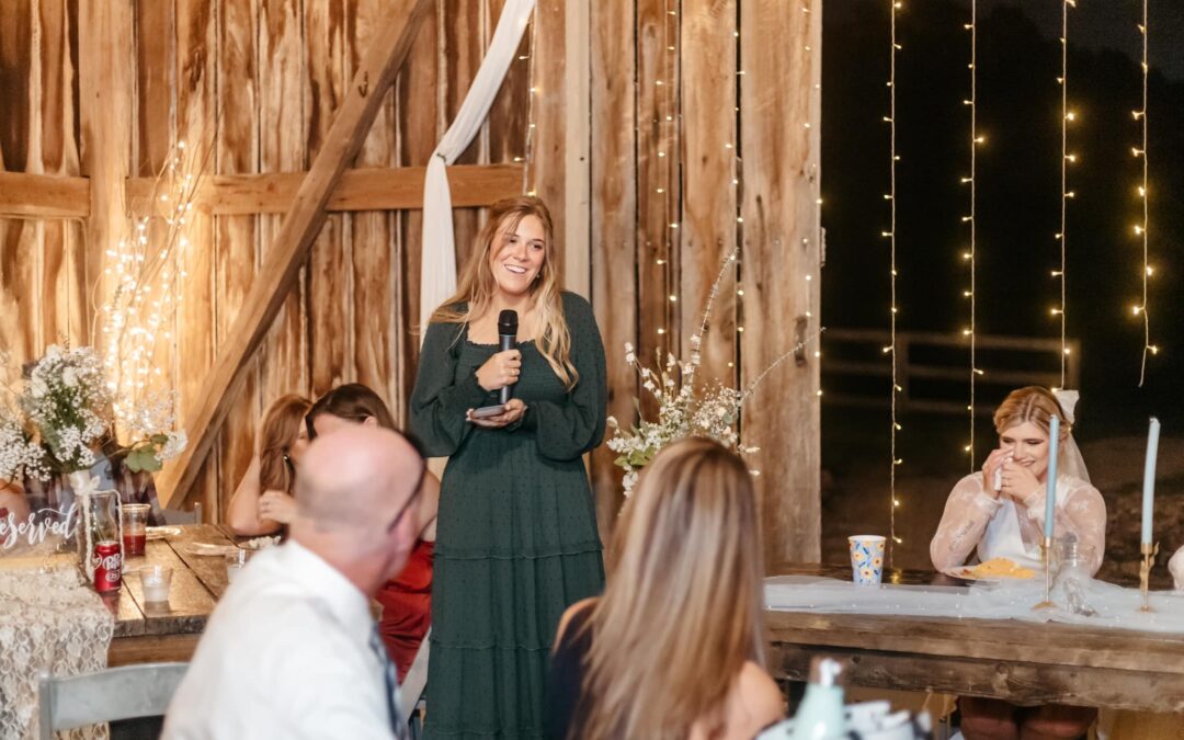 Guest giving a wedding toast at the reception.